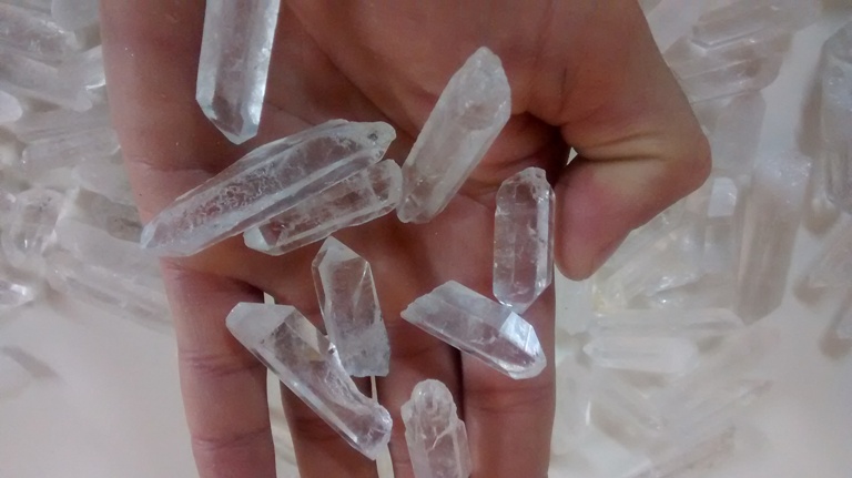 Stones from Uruguay - Lemurian Crystal Points Being Selected for Pendant