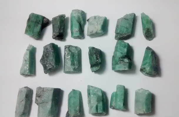 Stones from Uruguay - Rough Emerald Being Selected to Turn Pendants