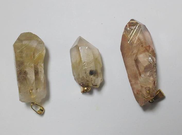Stones from Uruguay - Golden Rutile Point Pendant with Hole and Bail